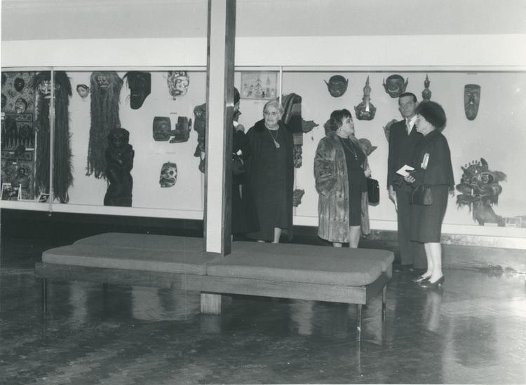 Image of Photograph: five guests in front of  display cases during the ceremony for the modernisation of the South Hall, 1965