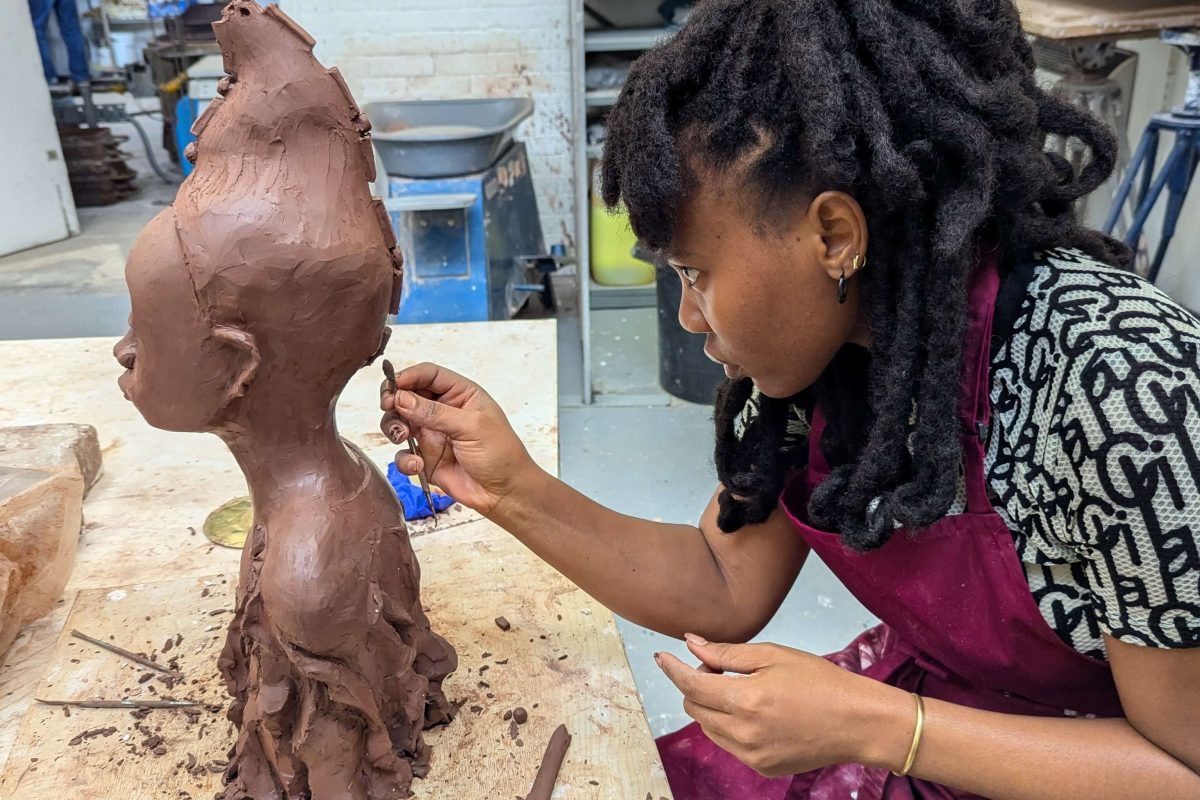 Osaru Obaseki working on a mould at Winchester School of Art.